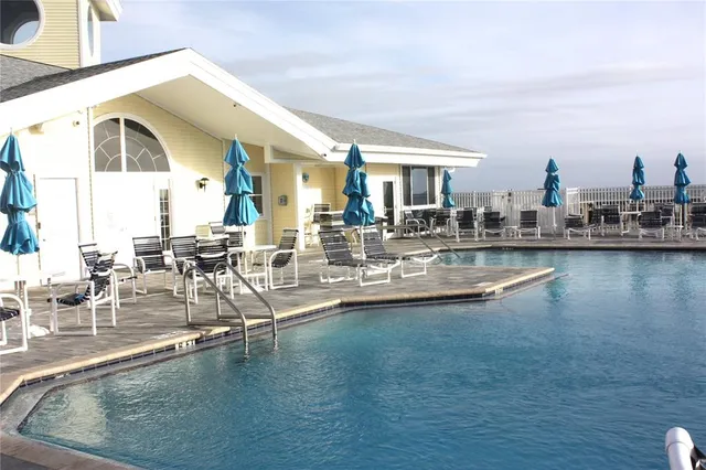 a view of a swimming pool and outdoor space