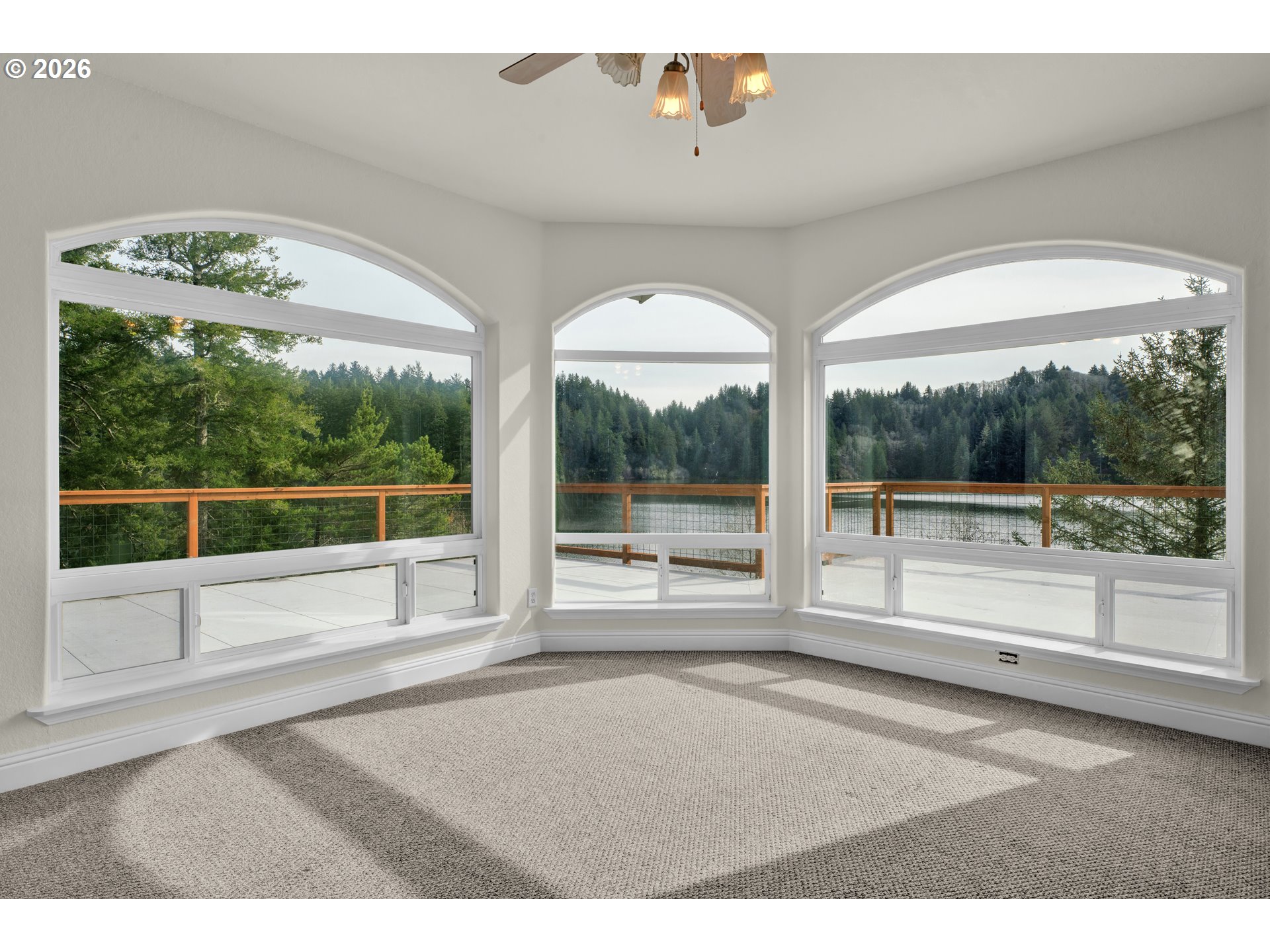 5816 Martin Road Florence, OR 97439 - Photo 38 of 47 a view of an empty room with a large window