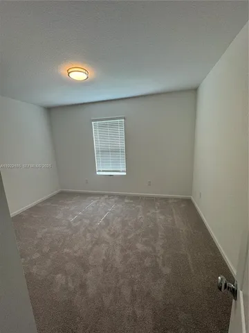 a front view of a house with a garage