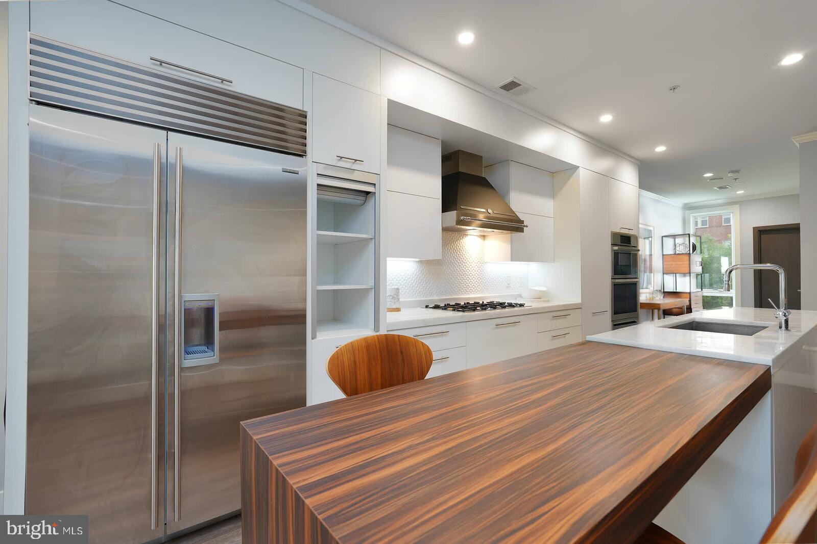 1461 Chapin Street Northwest Washington, DC 20009 - Photo 12 of 67 Sleek modern kitchen with elegant finishes.