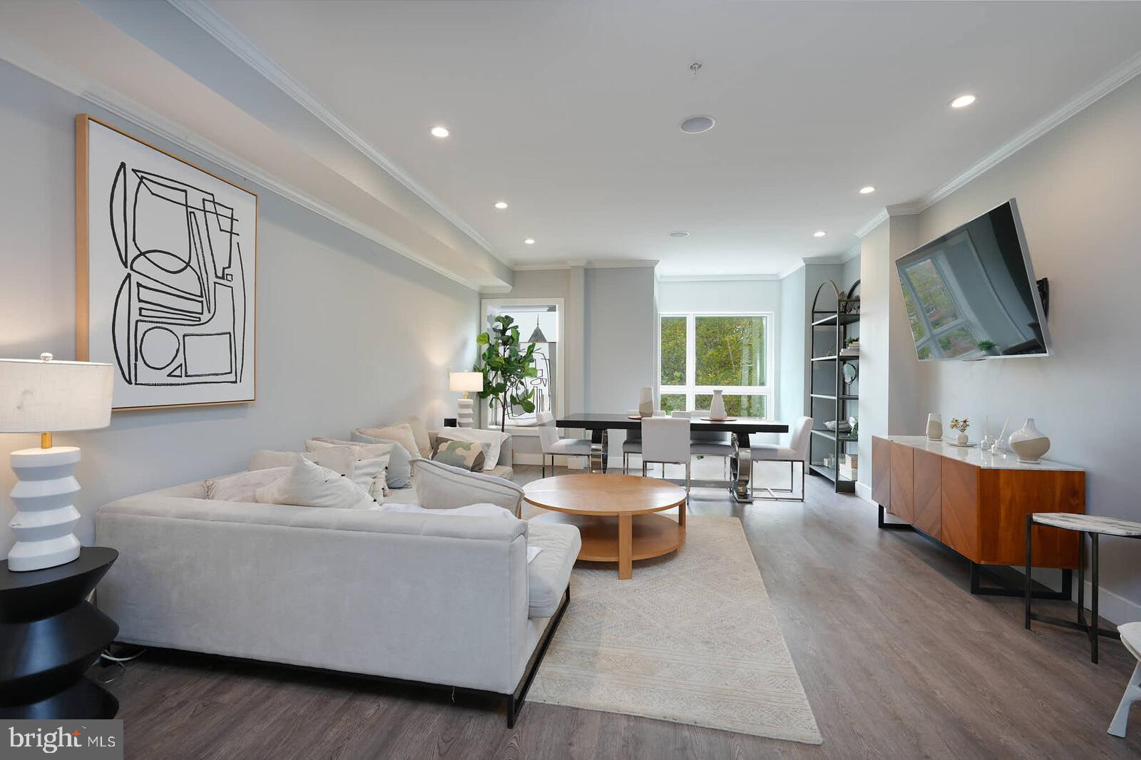 1461 Chapin Street Northwest Washington, DC 20009 - Photo 13 of 67 a living room with furniture and a flat screen tv