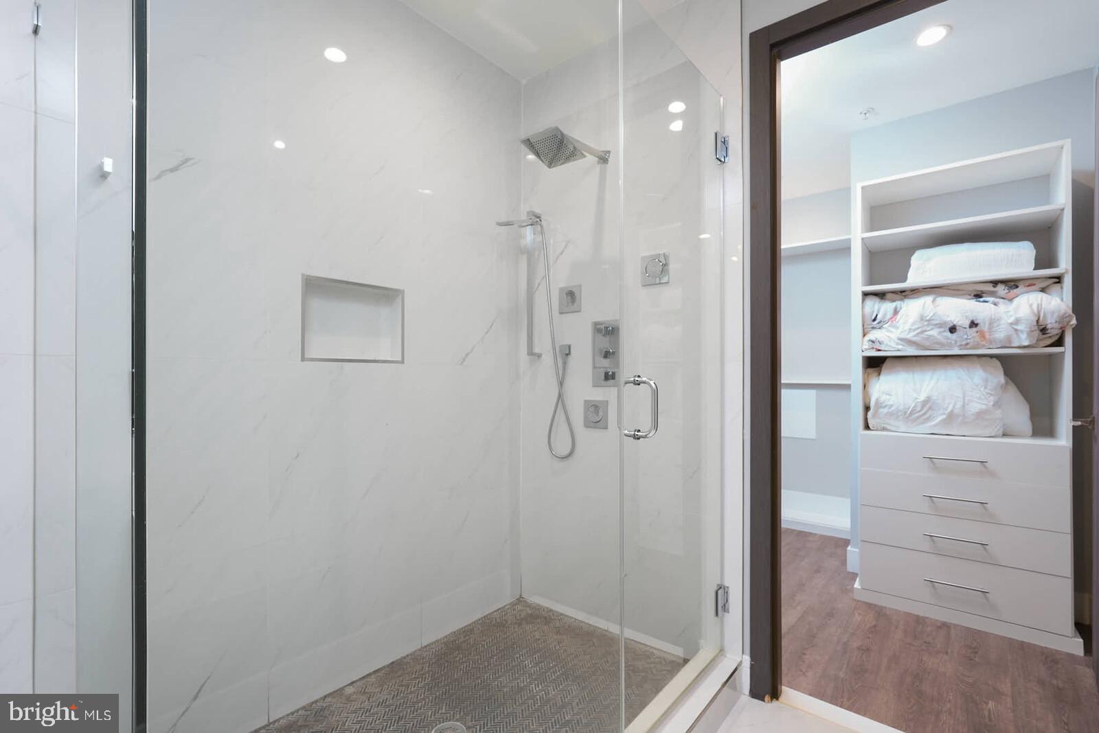 1461 Chapin Street Northwest Washington, DC 20009 - Photo 27 of 67 Sleek modern shower with elegant finishes.