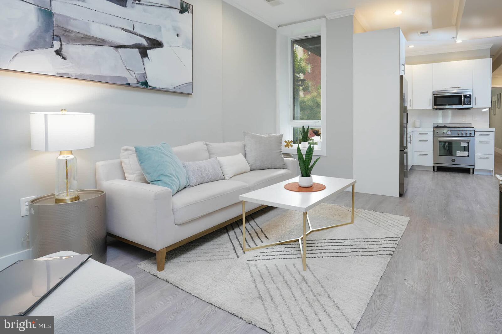 1461 Chapin Street Northwest Washington, DC 20009 - Photo 31 of 67 a living room with furniture and a wooden floor