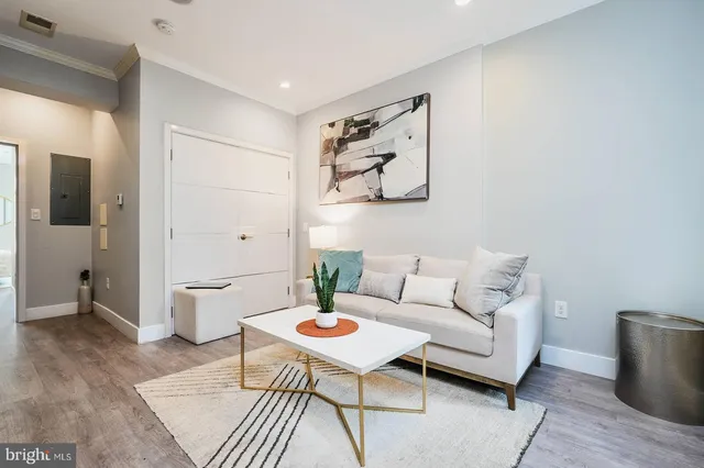 a view of room with wooden floor