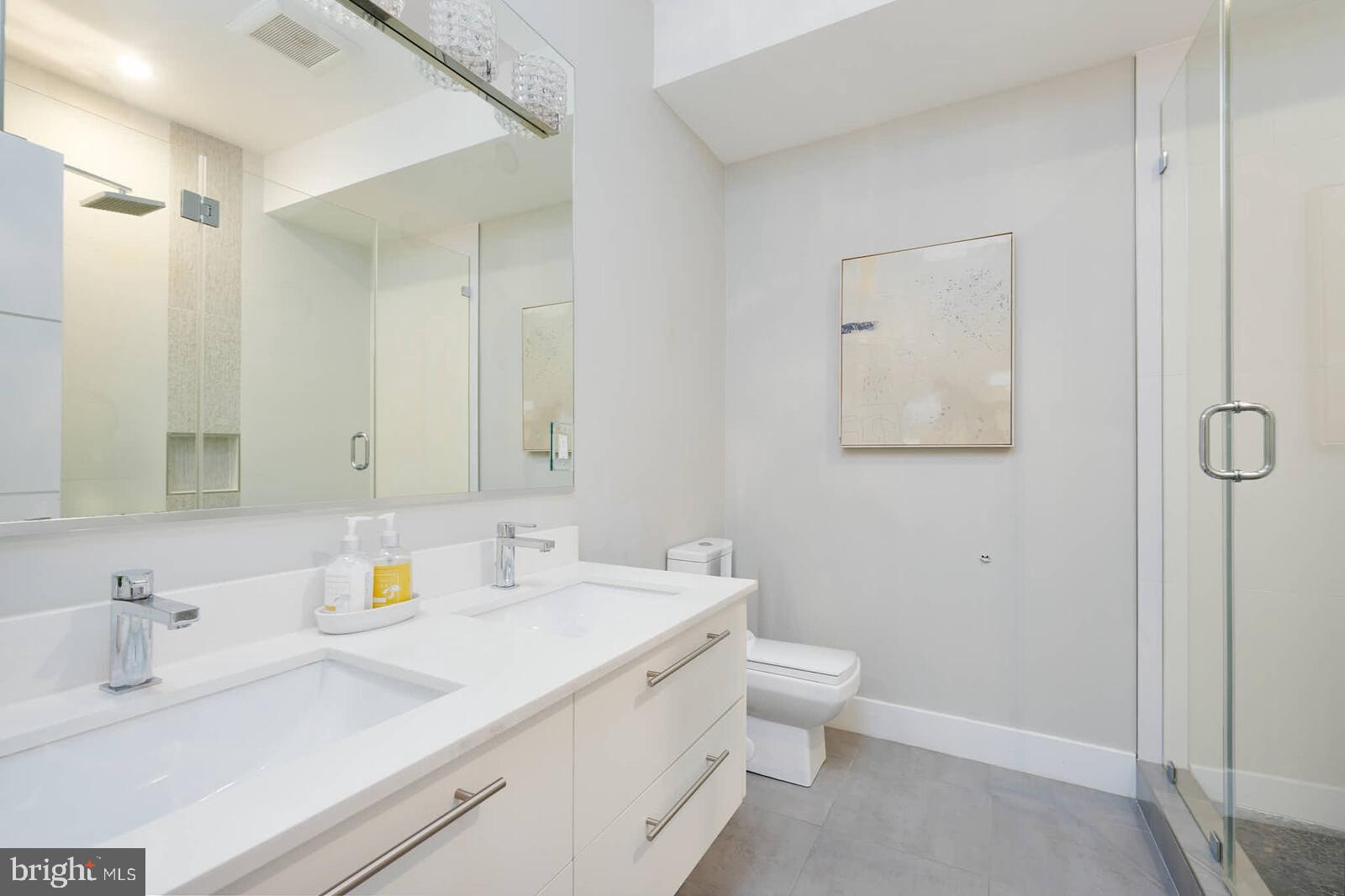 1461 Chapin Street Northwest Washington, DC 20009 - Photo 43 of 67 Sleek modern bathroom with elegant finishes.