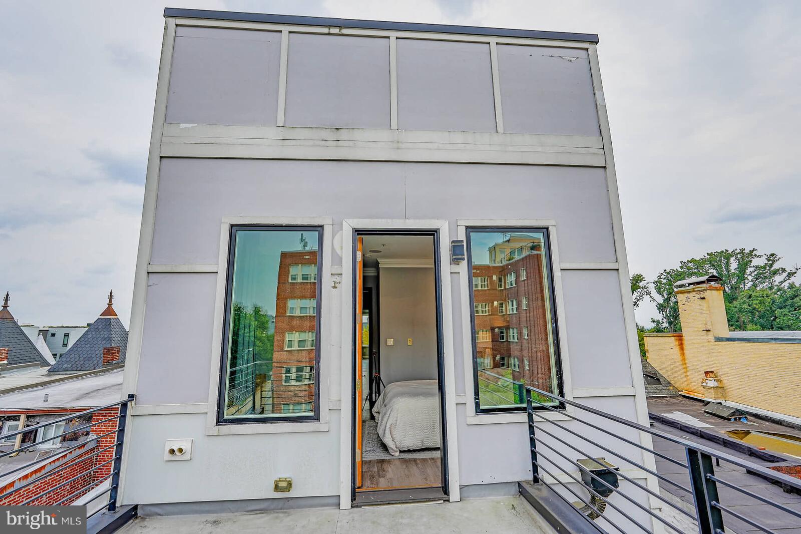 1461 Chapin Street Northwest Washington, DC 20009 - Photo 6 of 67 Modern rooftop retreat with urban views.