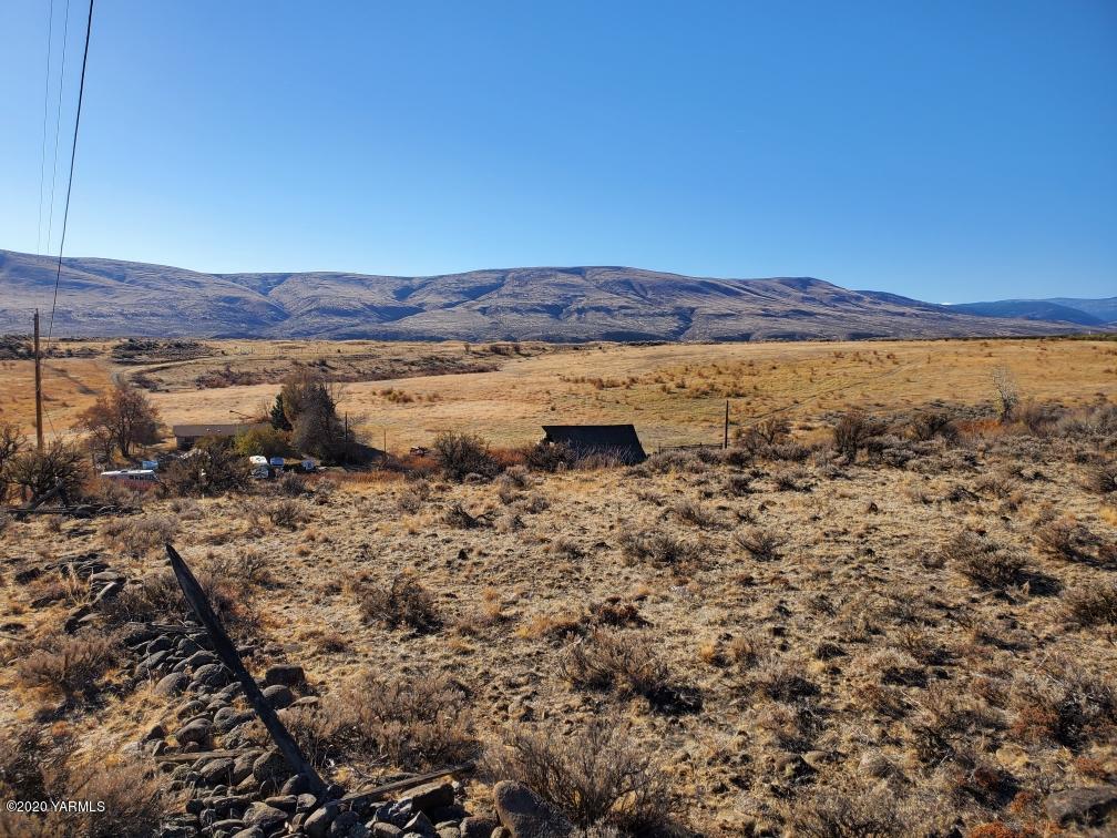 Nka Slavin Road West Yakima, WA 98903 - Photo 8 of 11 a view of a lake with a mountain in the background