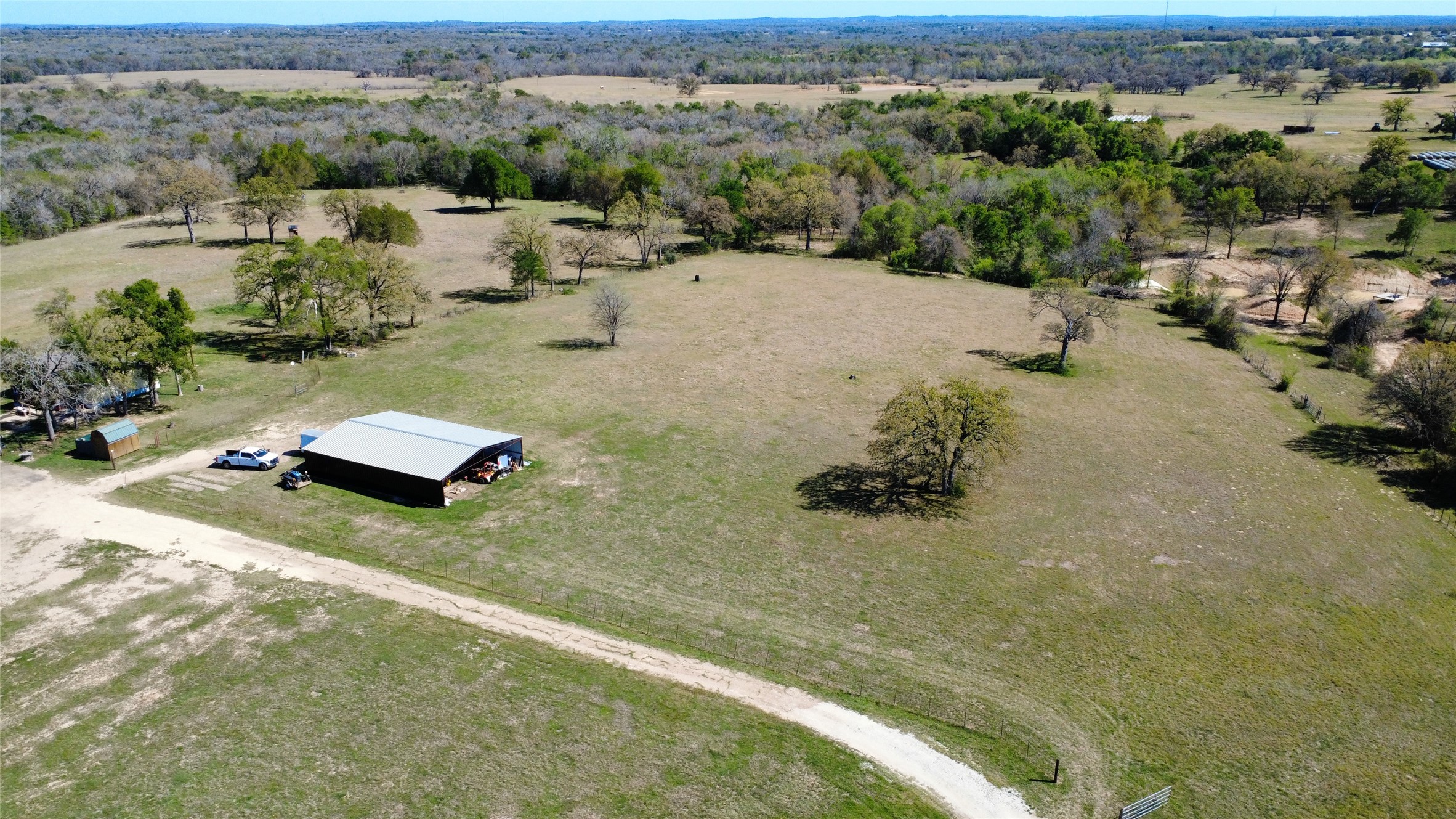 1042 Los Ranchitos Road Cameron, TX 76520 - Photo 32 of 40 an aerial view of a houses with a yard