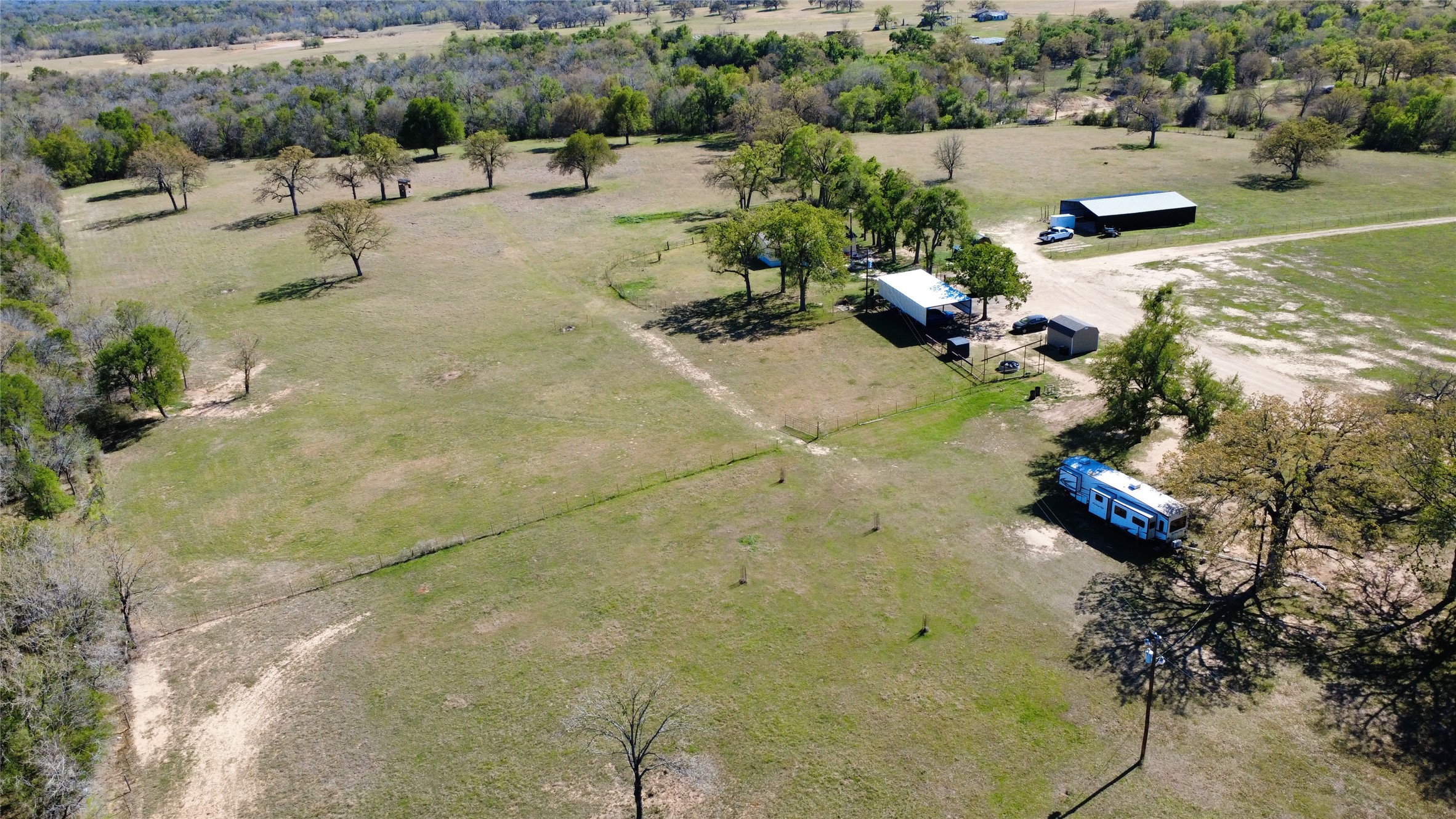 1042 Los Ranchitos Road Cameron, TX 76520 - Photo 37 of 40 a view of a lake with outdoor space