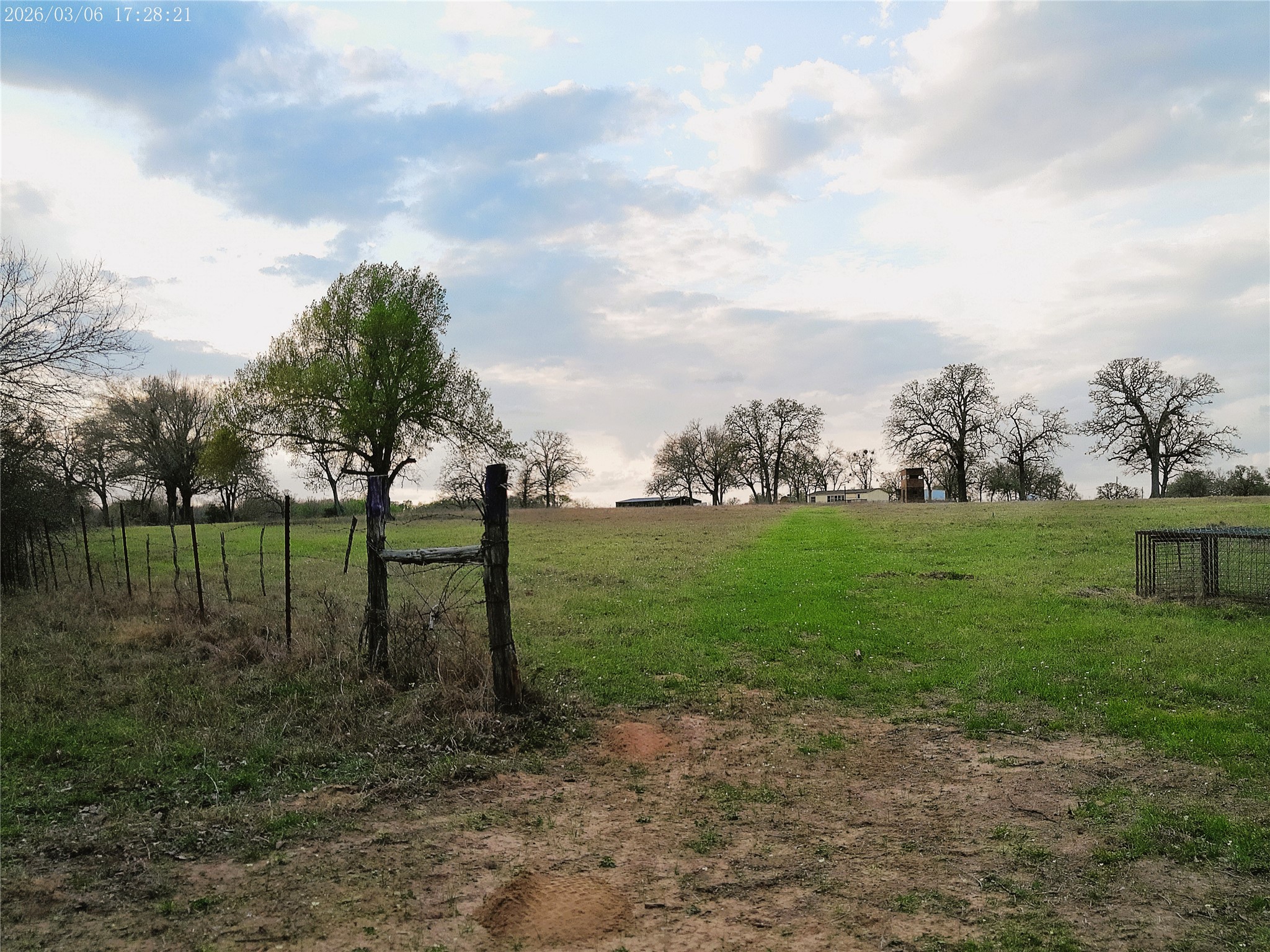 1042 Los Ranchitos Road Cameron, TX 76520 - Photo 37 of 40 a view of a golf course with a garden