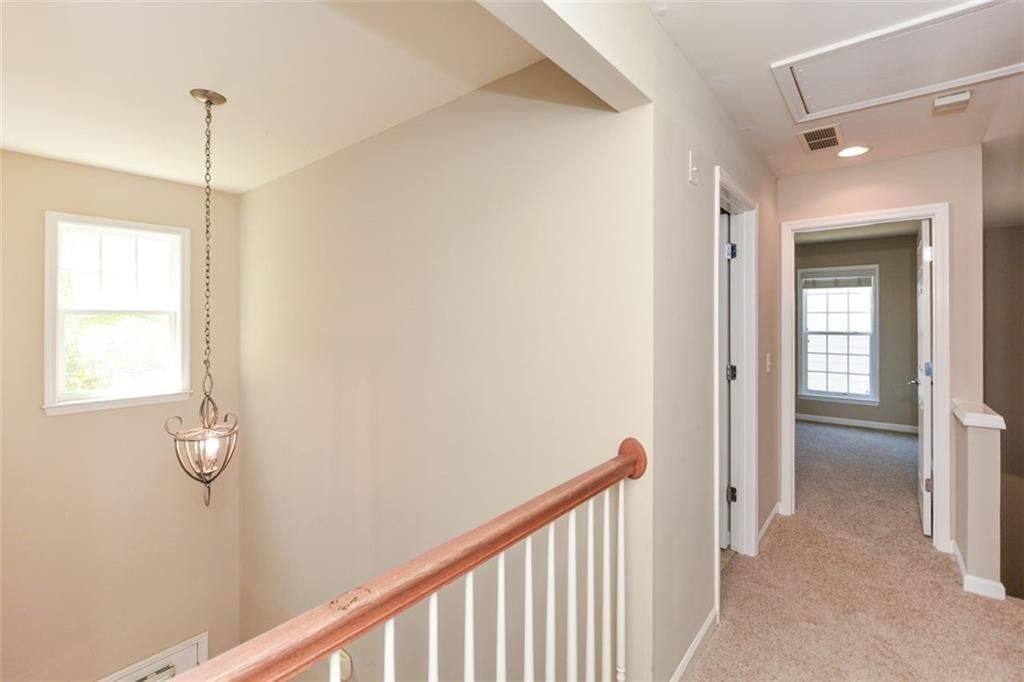 710 Berkeley Terrace Canton, GA 30115 - Photo 26 of 49 a view of a hallway with a window