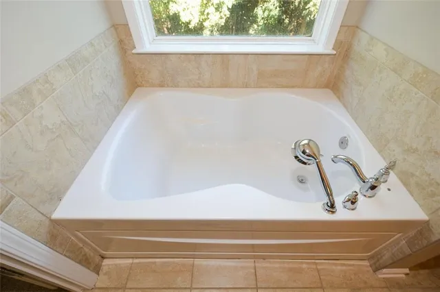 a bathroom with a bathtub