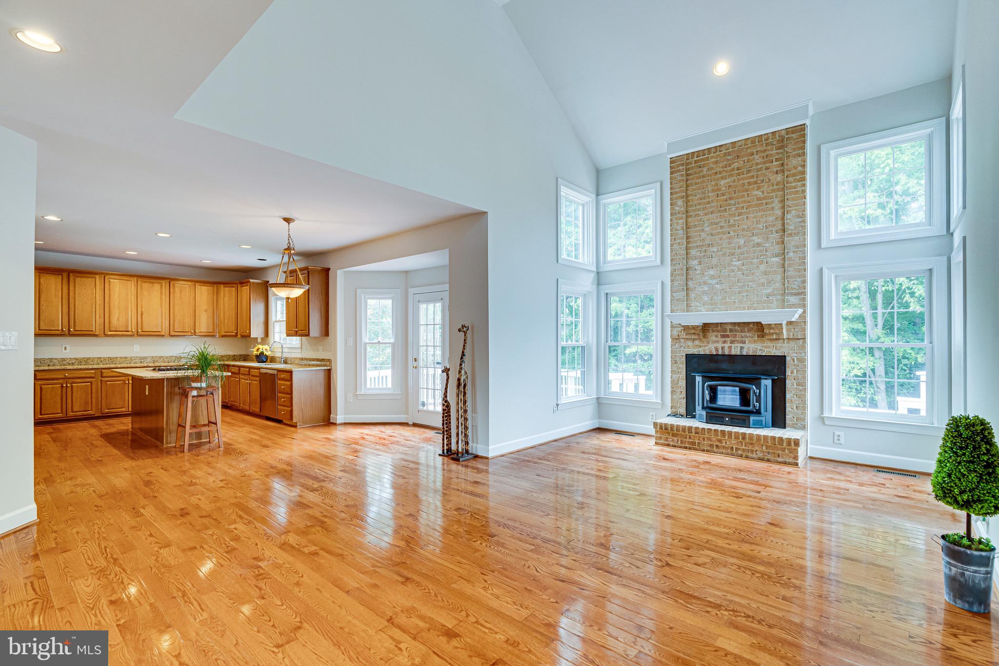 1936 Lord Fairfax Road Vienna, VA 22182 - Photo 23 of 81 a view of a livingroom with a fireplace a fireplace and window