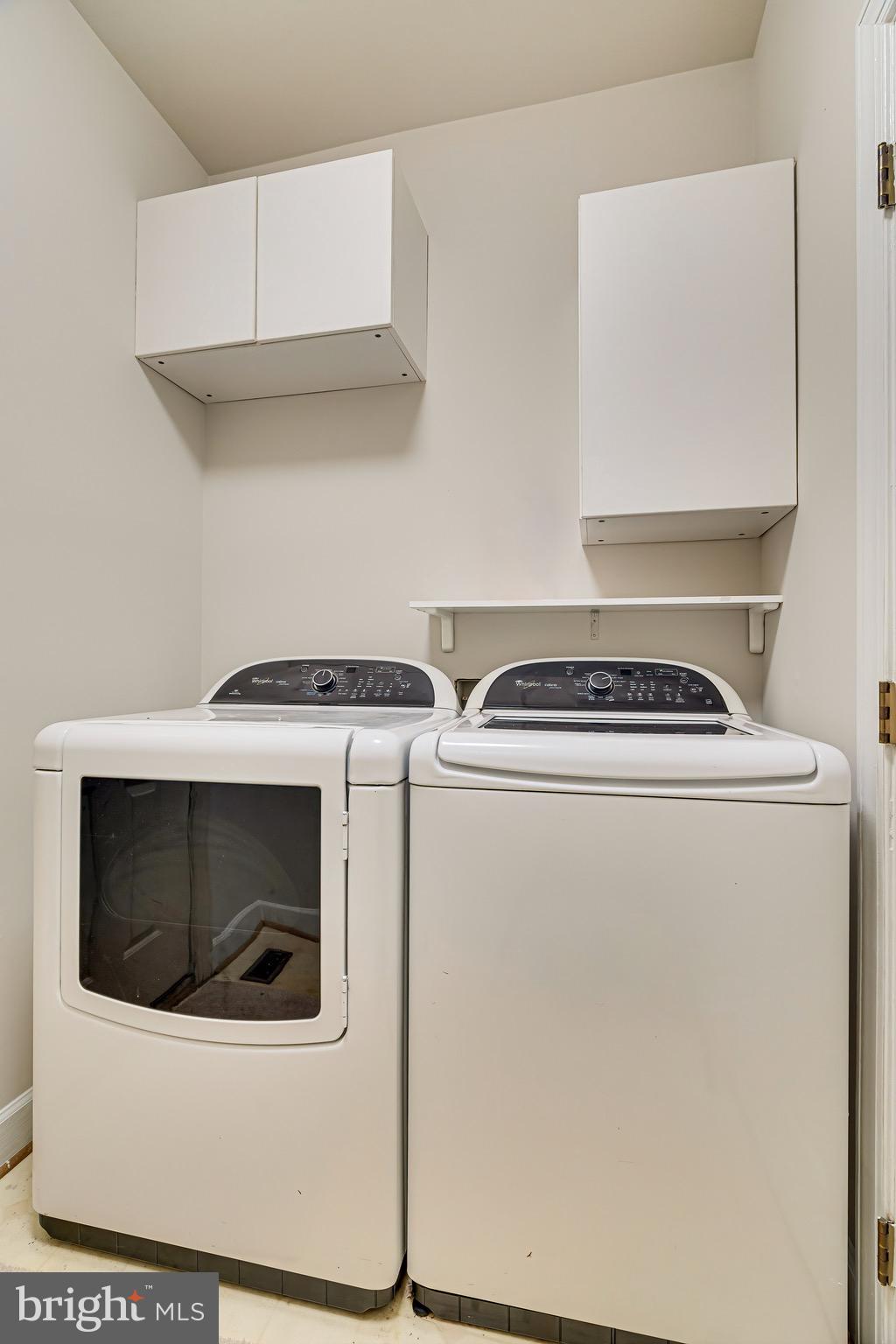 1936 Lord Fairfax Road Vienna, VA 22182 - Photo 33 of 81 a utility room with washer and dryer