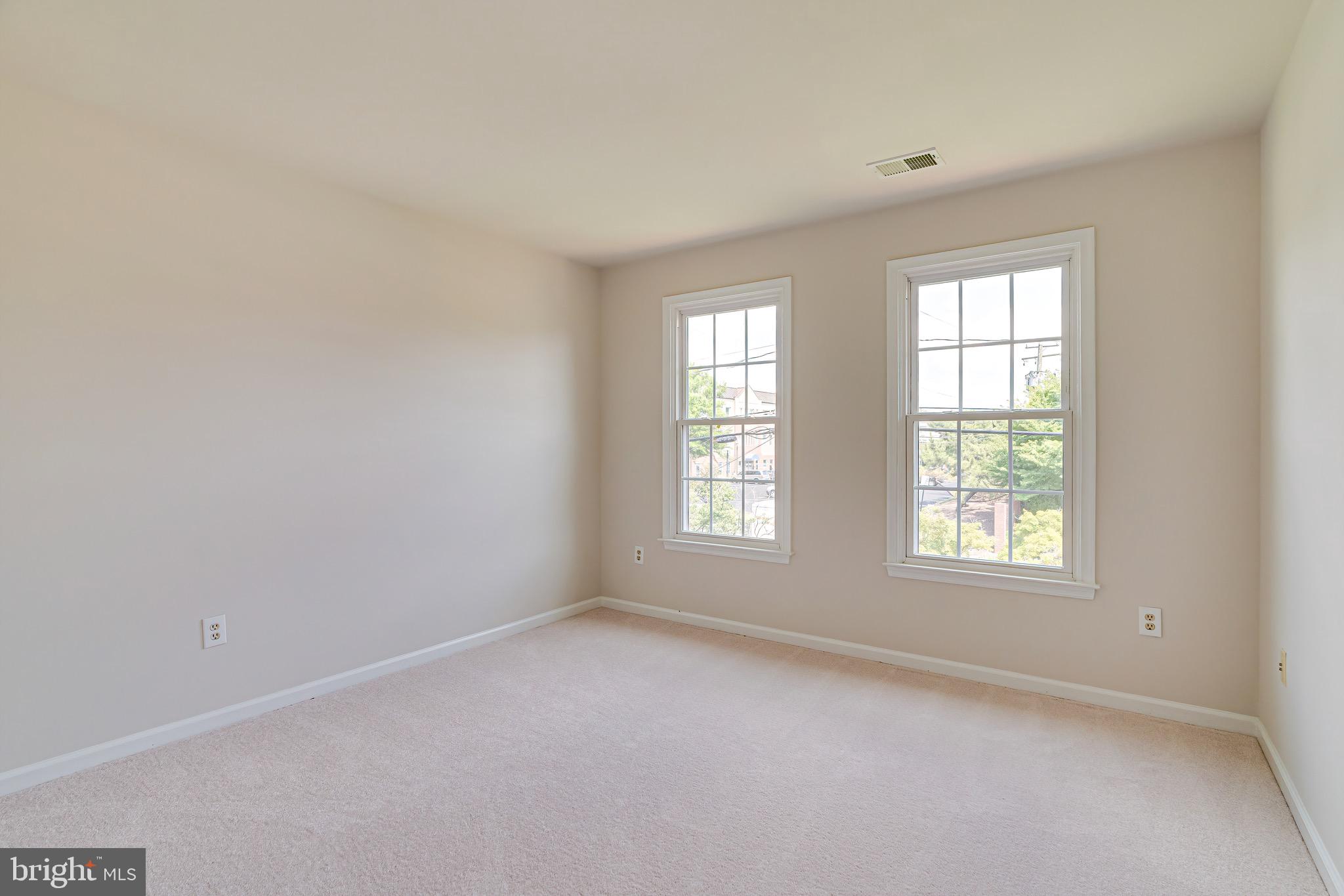 1936 Lord Fairfax Road Vienna, VA 22182 - Photo 46 of 81 an empty room with windows