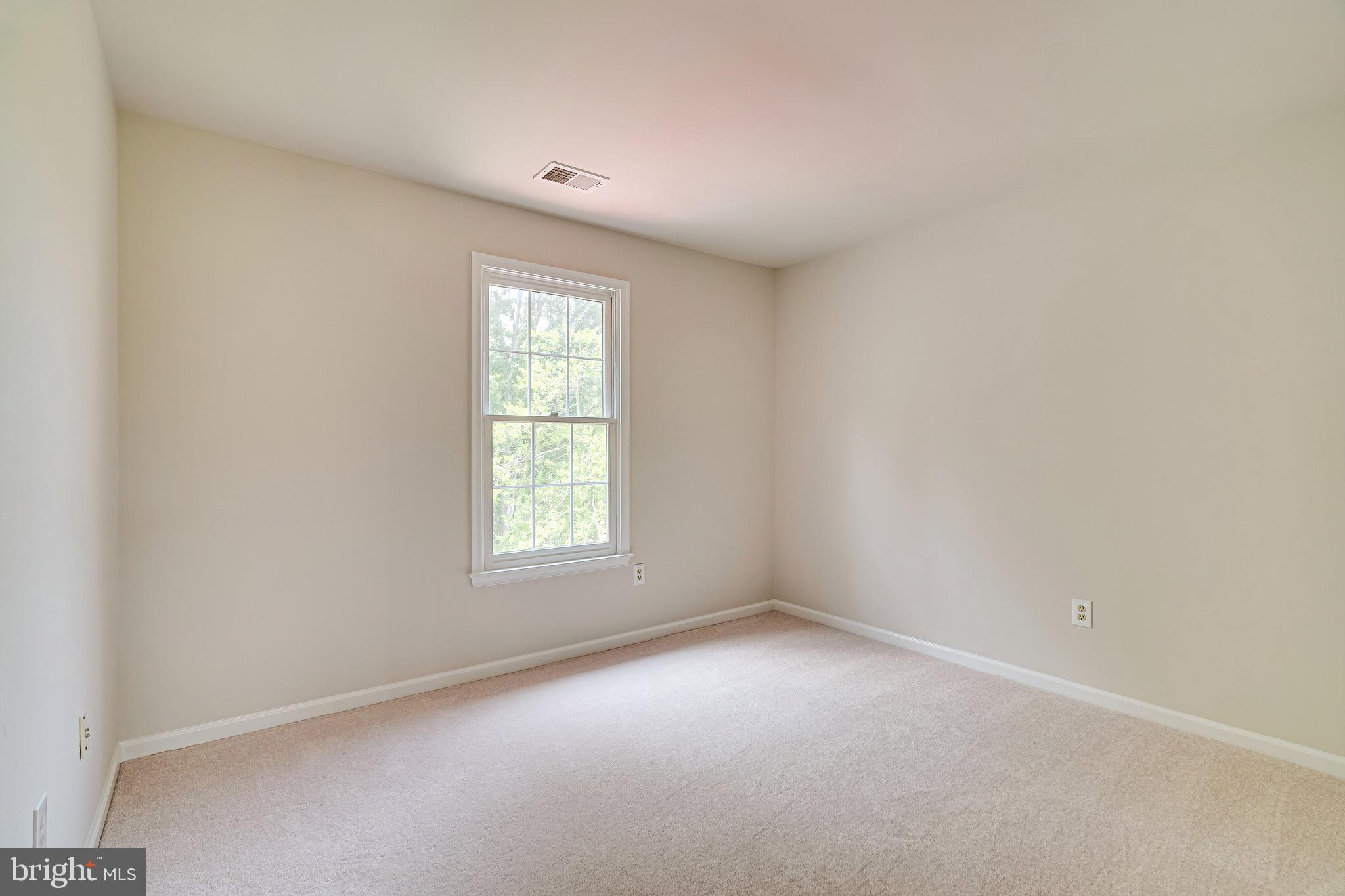 1936 Lord Fairfax Road Vienna, VA 22182 - Photo 50 of 81 an empty room with a window