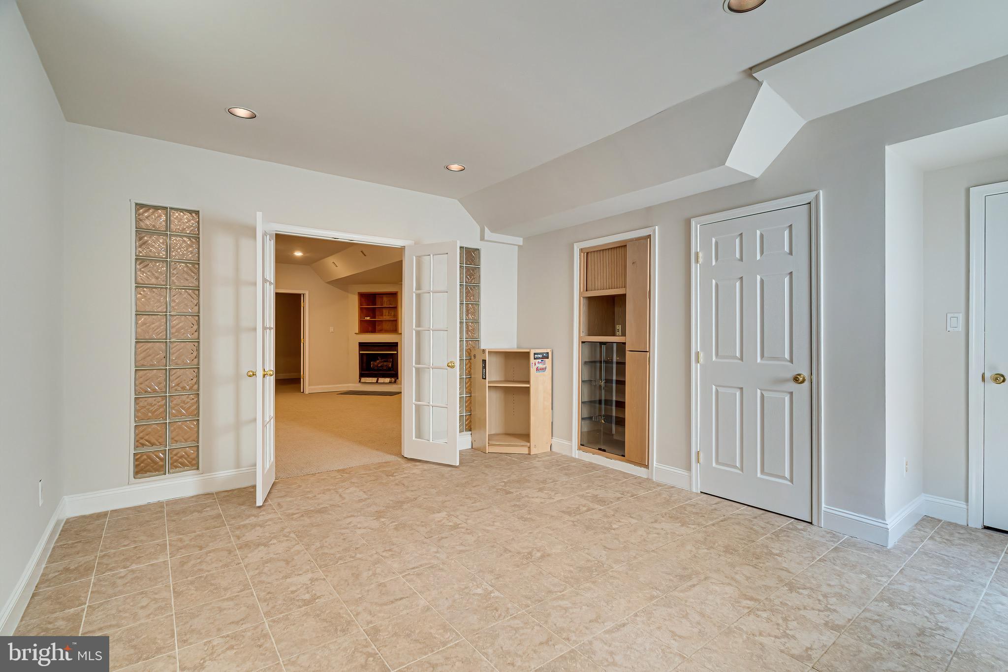 1936 Lord Fairfax Road Vienna, VA 22182 - Photo 62 of 81 an empty room with closet and wooden door