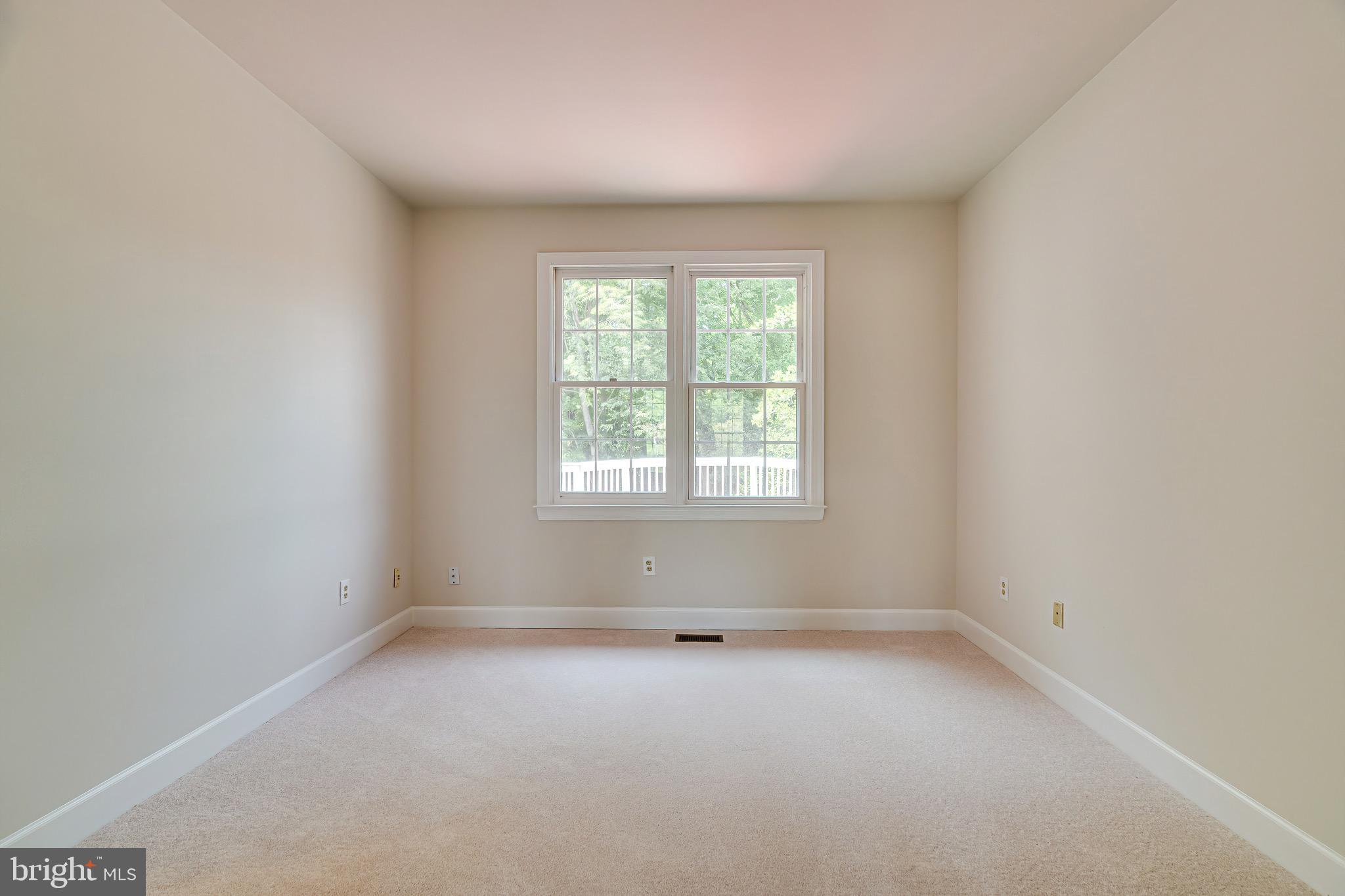 1936 Lord Fairfax Road Vienna, VA 22182 - Photo 10 of 81 an empty room with a window