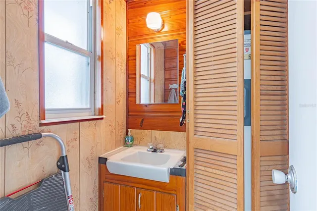 an aerial view of a house with a garden