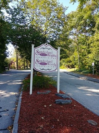 340 Sunderland Road, Unit 36G Worcester, MA 01604 - Photo 2 of 19 a sign on the side of a road