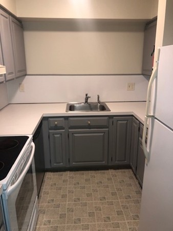 340 Sunderland Road, Unit 36G Worcester, MA 01604 - Photo 4 of 19 a kitchen with a sink and cabinets