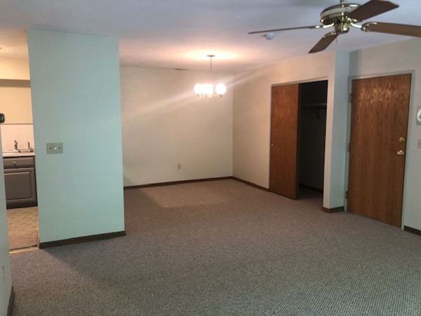 340 Sunderland Road, Unit 36G Worcester, MA 01604 - Photo 7 of 19 an empty room with closet and a chandelier fan