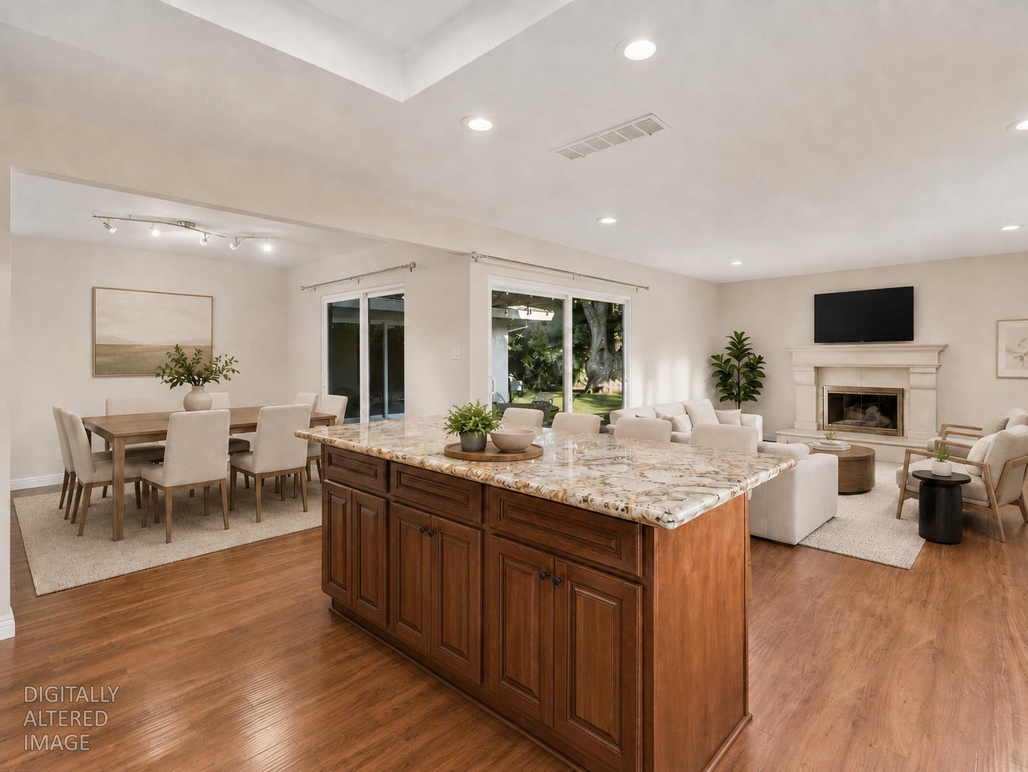 1540 Gregory Way Carmichael, CA 95608 - Photo 17 of 76 a kitchen with lots of counter top space and living room