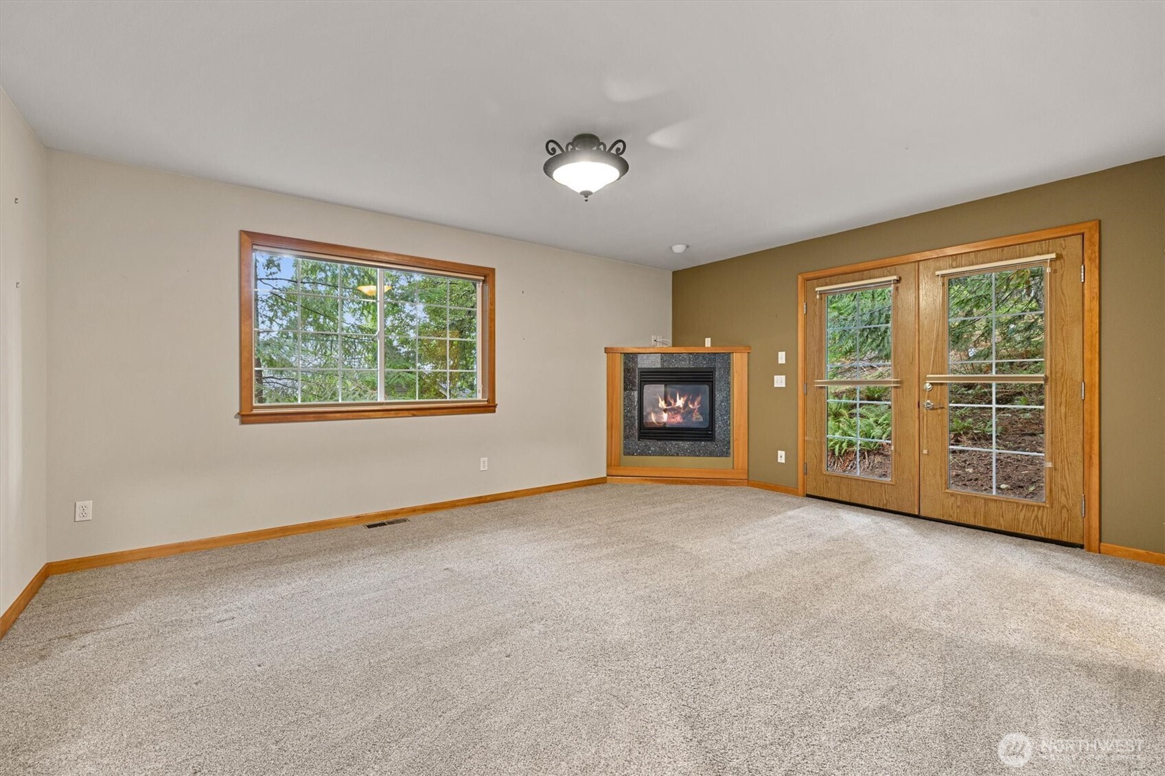 28 Grand View Lane Bellingham, WA 98229 - Photo 15 of 33 a view of an empty room with a window and a fireplace