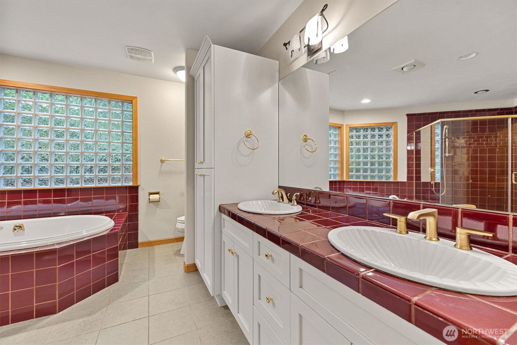 28 Grand View Lane Bellingham, WA 98229 - Photo 20 of 33 a spacious bathroom with double vanity sink a mirror a bathtub and shower