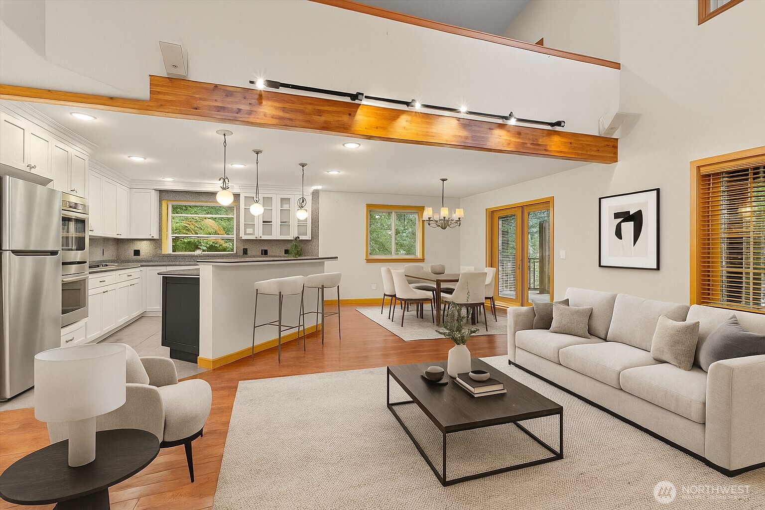 28 Grand View Lane Bellingham, WA 98229 - Photo 6 of 33 a living room with furniture kitchen view and a wooden floor