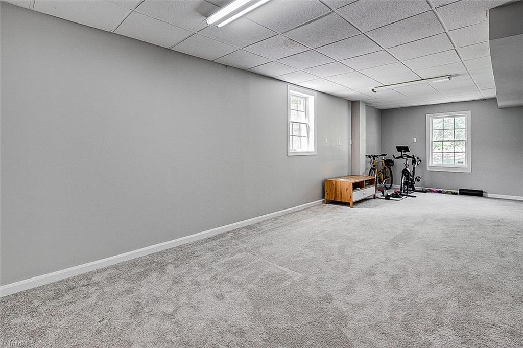 6103 Trotter Ridge Road Summerfield, NC 27358 - Photo 32 of 38 Recreation room in basement
