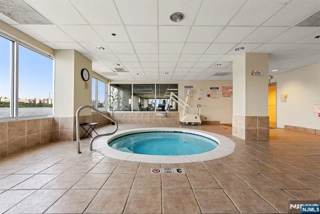 a view of a balcony with chairs