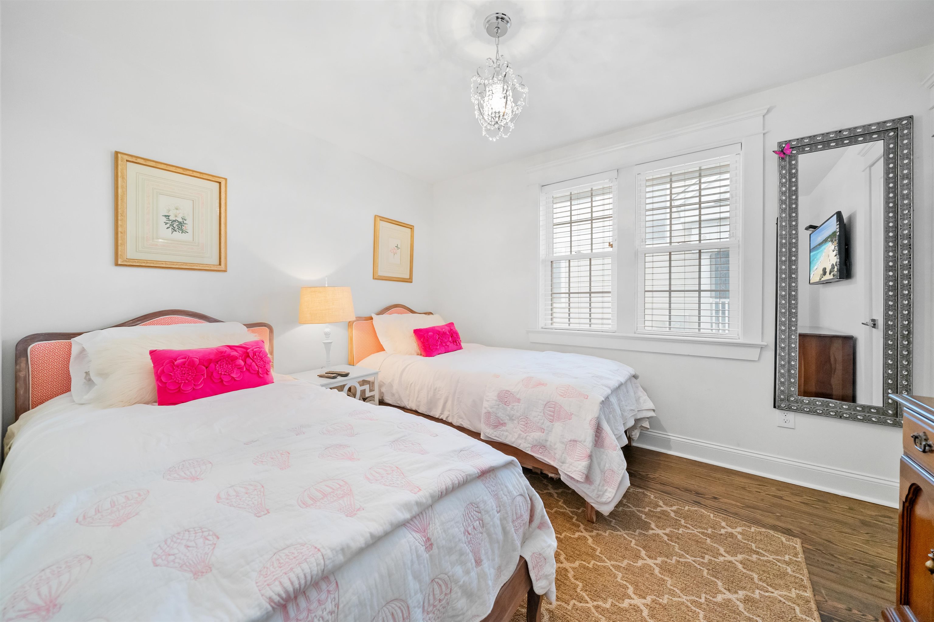 164 93rd Street Stone Harbor, NJ 08247 - Photo 11 of 47 a bedroom with two bed and a flat screen tv