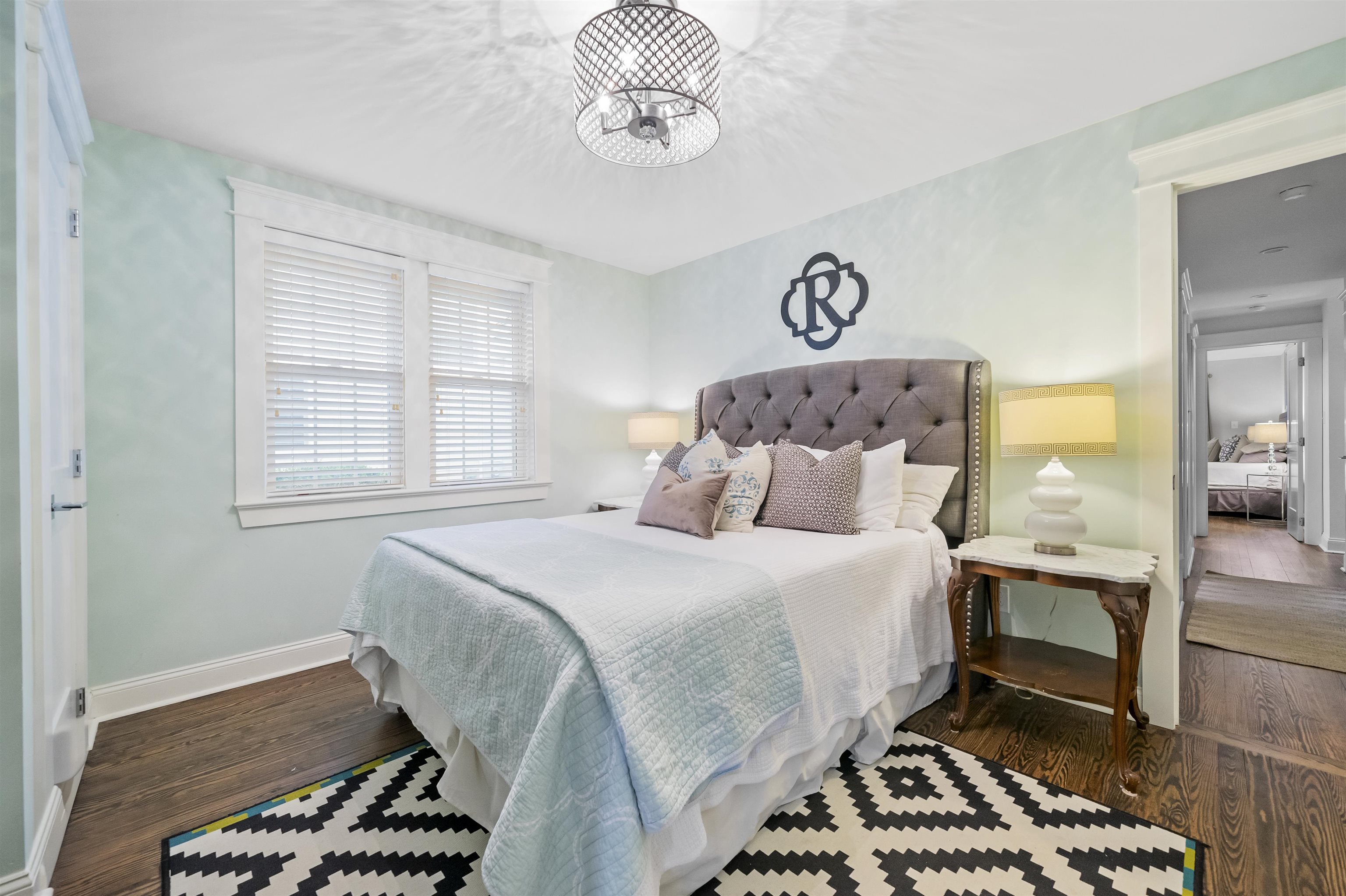 164 93rd Street Stone Harbor, NJ 08247 - Photo 12 of 47 a bedroom with a bed and a table