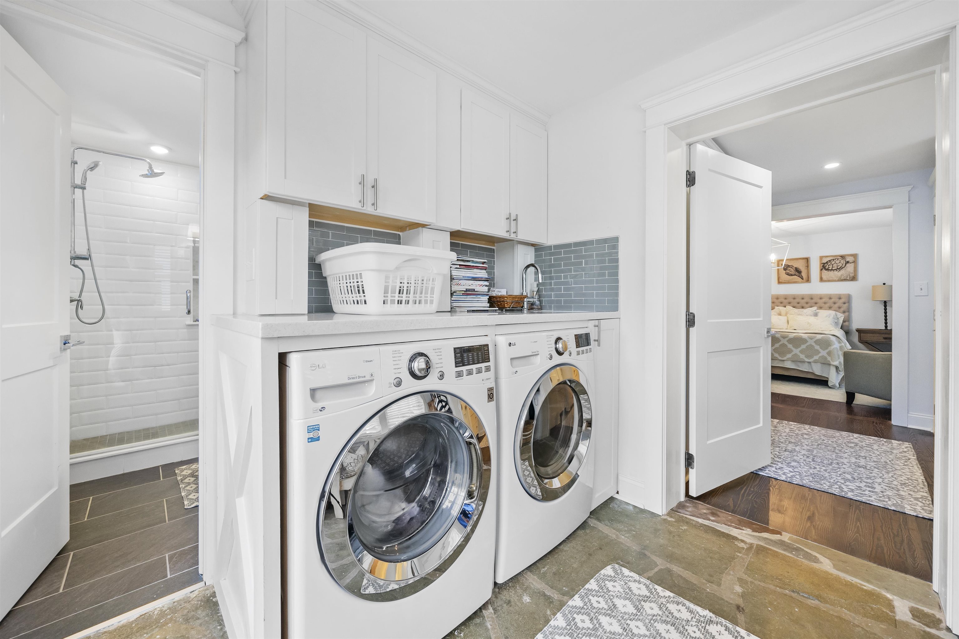 164 93rd Street Stone Harbor, NJ 08247 - Photo 18 of 47 a view of a hallway with washer and dryer