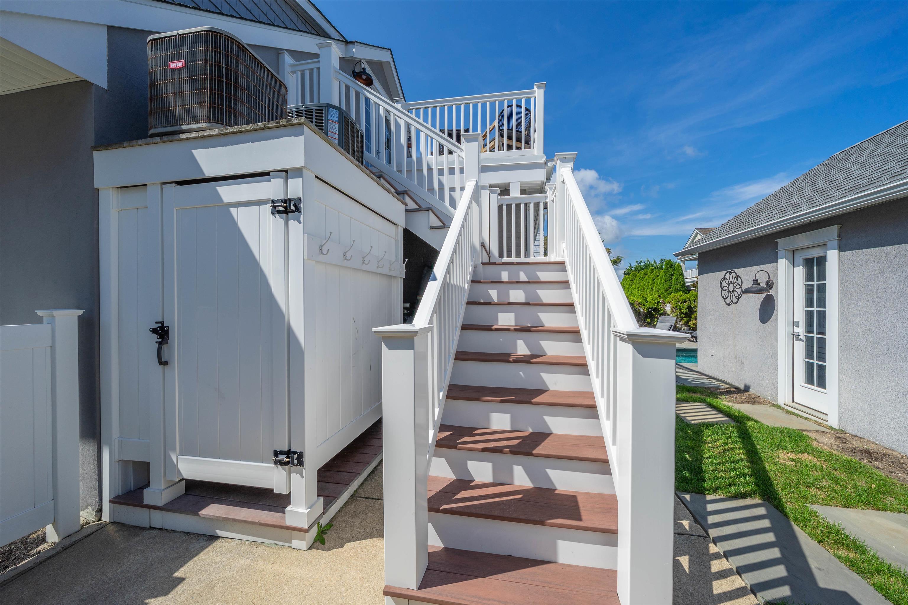 164 93rd Street Stone Harbor, NJ 08247 - Photo 24 of 47 a view of entryway with wooden floor and a front door