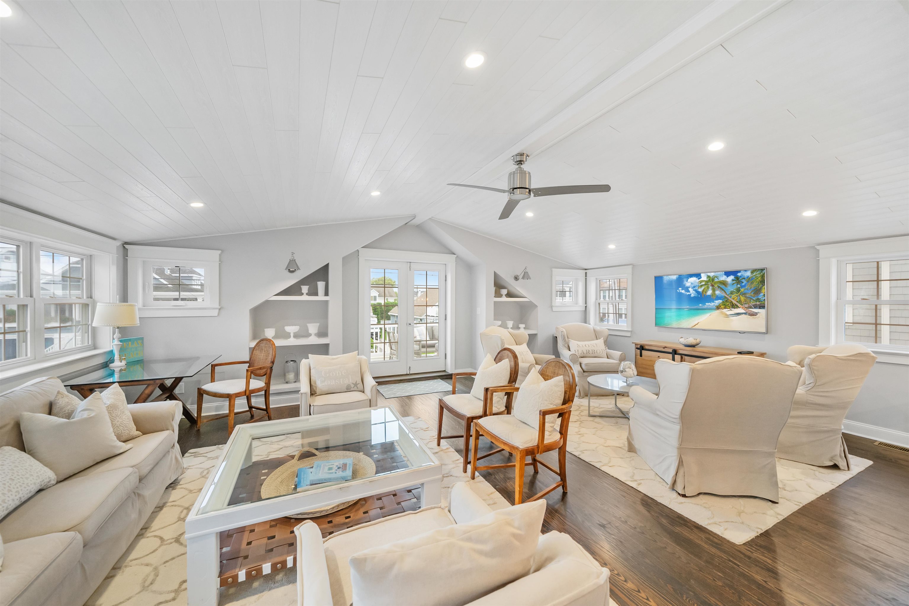 164 93rd Street Stone Harbor, NJ 08247 - Photo 25 of 47 a living room with furniture and a large window