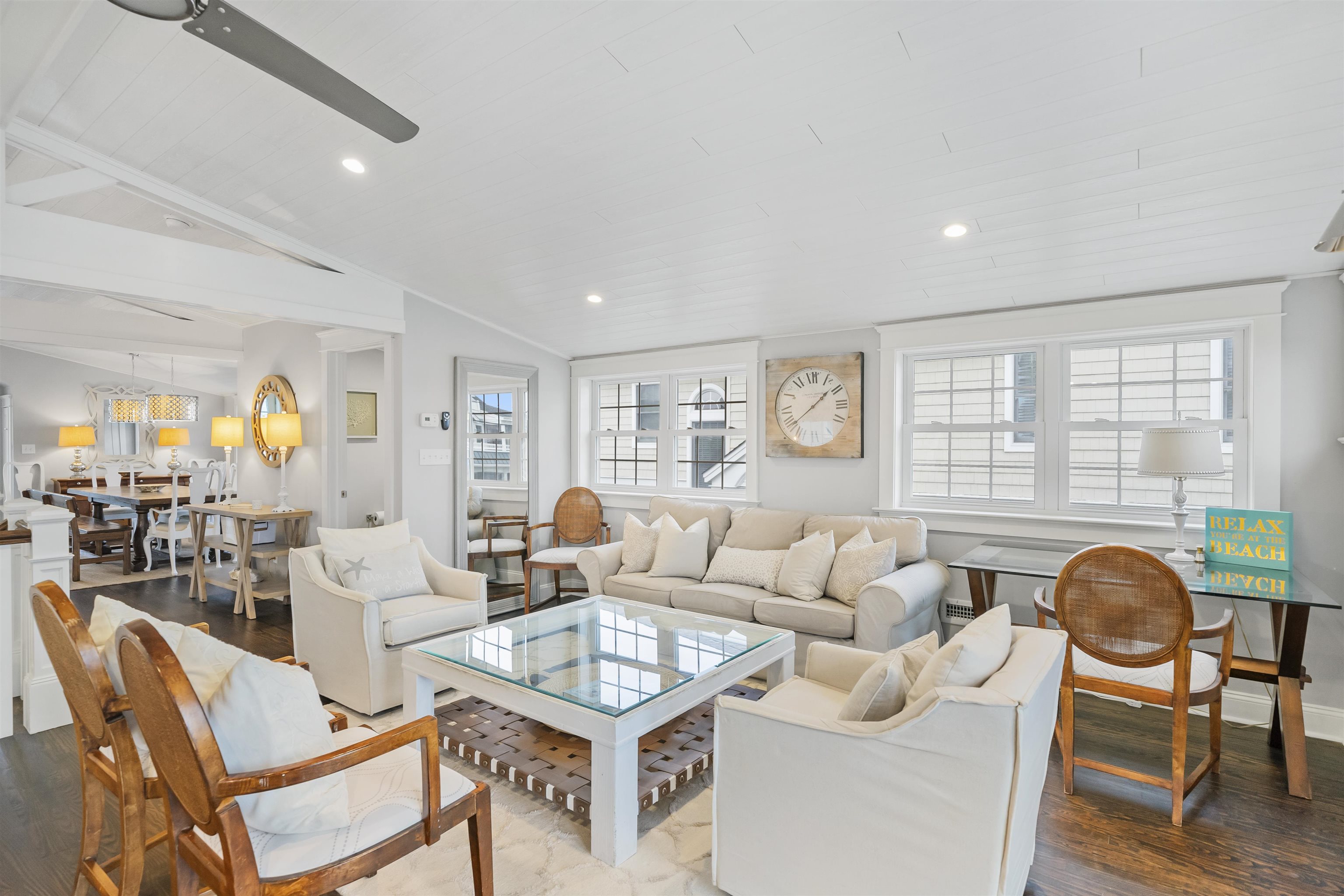 164 93rd Street Stone Harbor, NJ 08247 - Photo 27 of 47 a living room with furniture and a large window