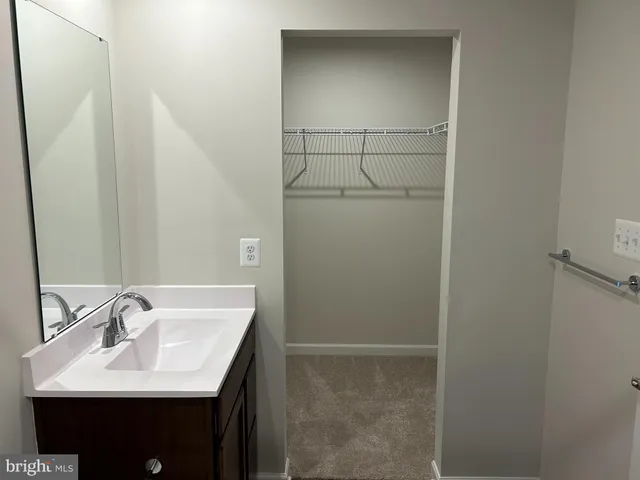 a bathroom with a shower and a bath tub
