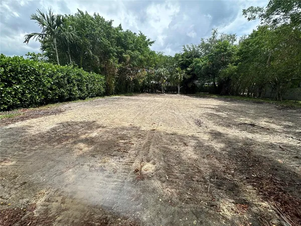 a view of backyard with green space
