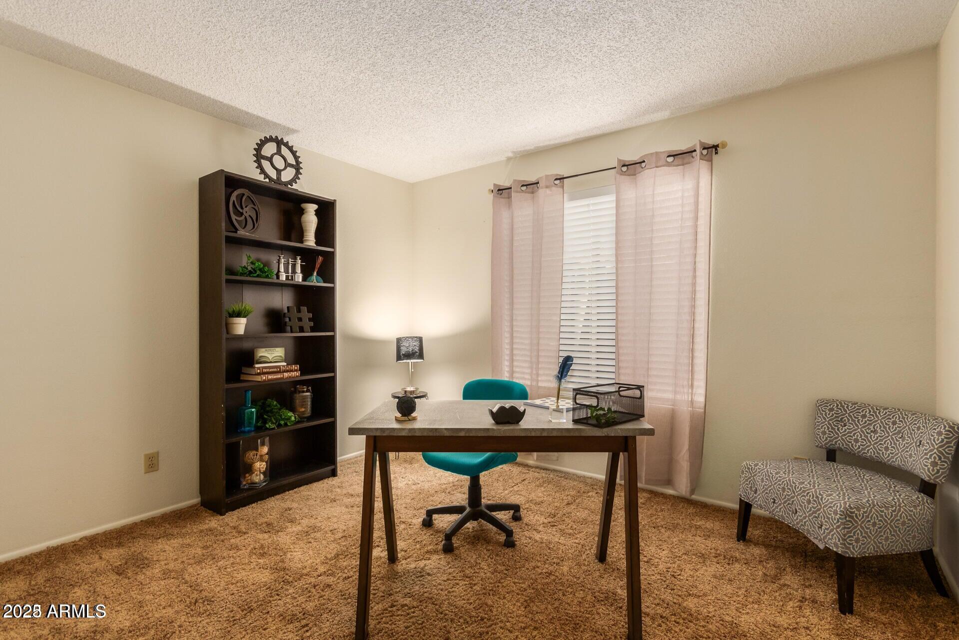 2221 West Rockwell Drive Chandler, AZ 85224 - Photo 12 of 14 a work room with furniture and a window
