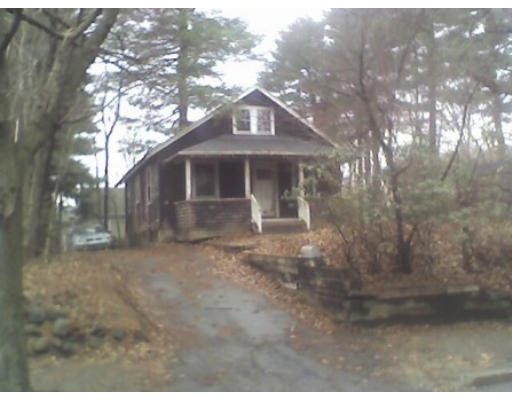63 Pierrepont Road Newton, MA 02462 - Photo 1 of 1 a front view of a house with yard