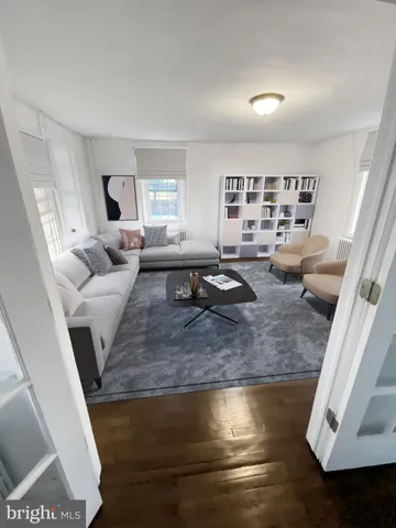 a living room with furniture and a couch