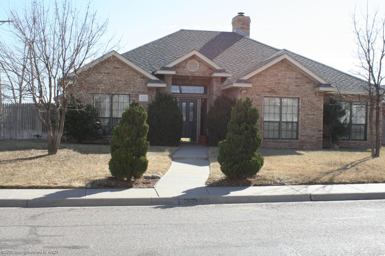 4201 Stepp Avenue Amarillo, TX 79110 - Photo 1 of 7 a front view of a house with garden