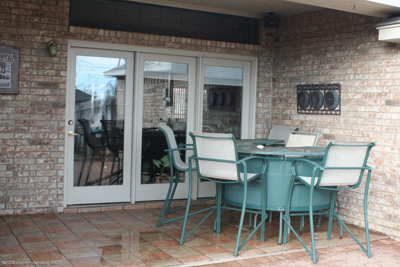4201 Stepp Avenue Amarillo, TX 79110 - Photo 5 of 7 a outdoor dining space with furniture and a potted plant