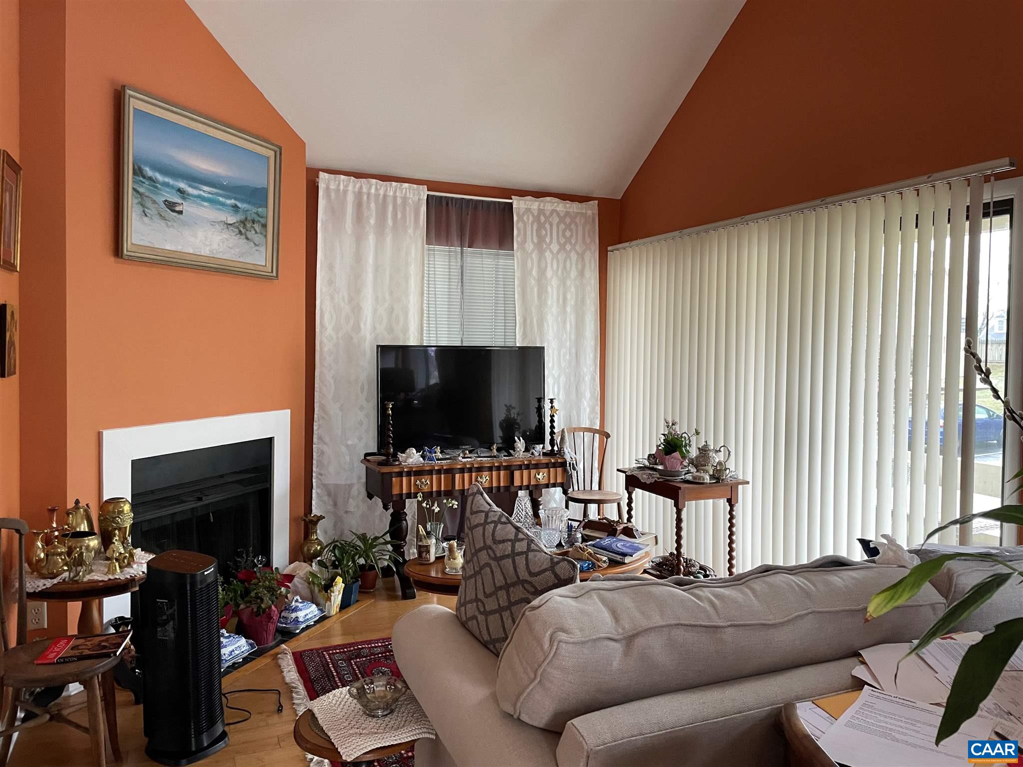 1218 Chatham Ridge Charlottesville, VA 22901 - Photo 5 of 14 a living room with furniture and a flat screen tv
