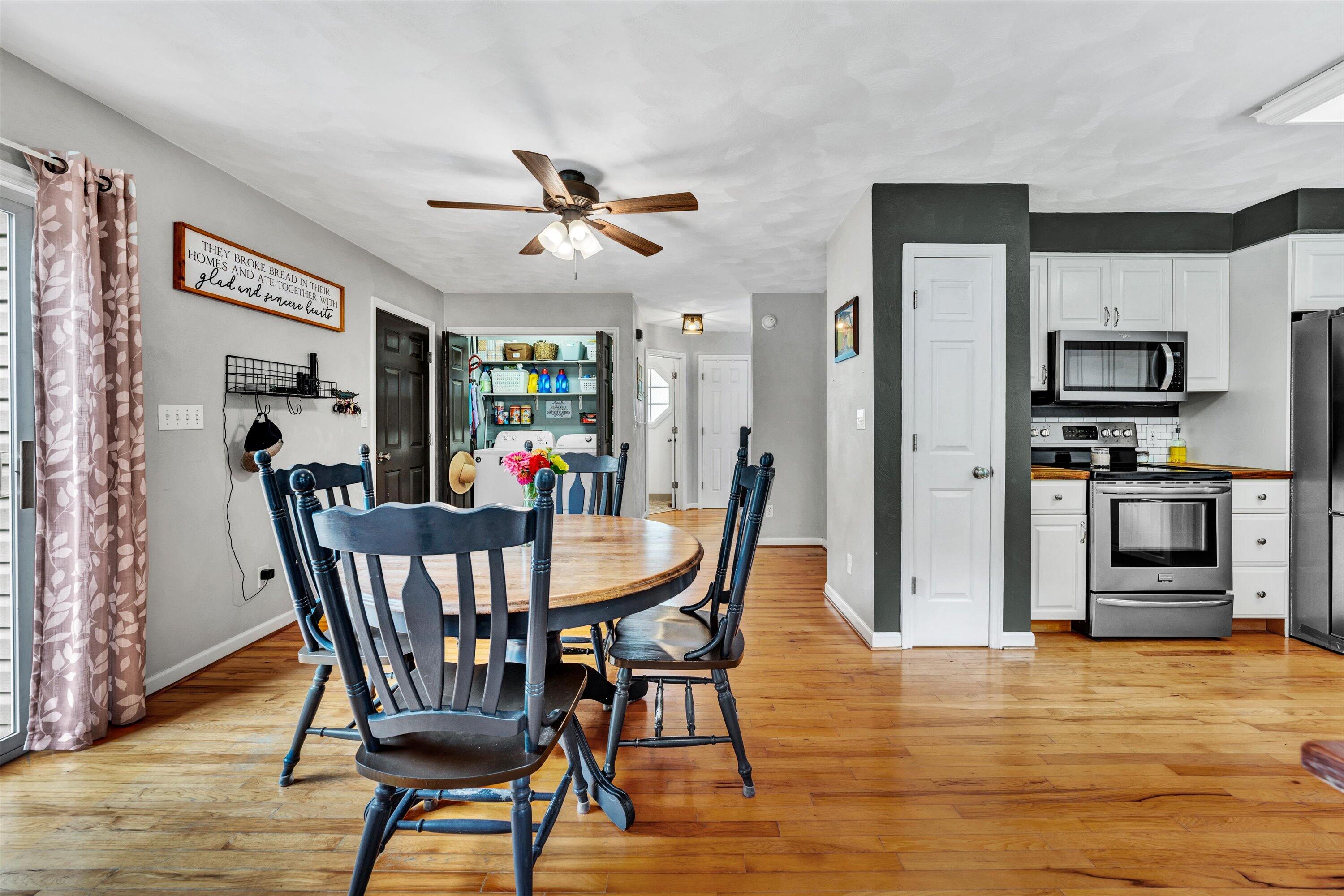 140 Charlie Road Hardy, VA 24101 - Photo 16 of 33 a view of a dining room with furniture and a kitchen