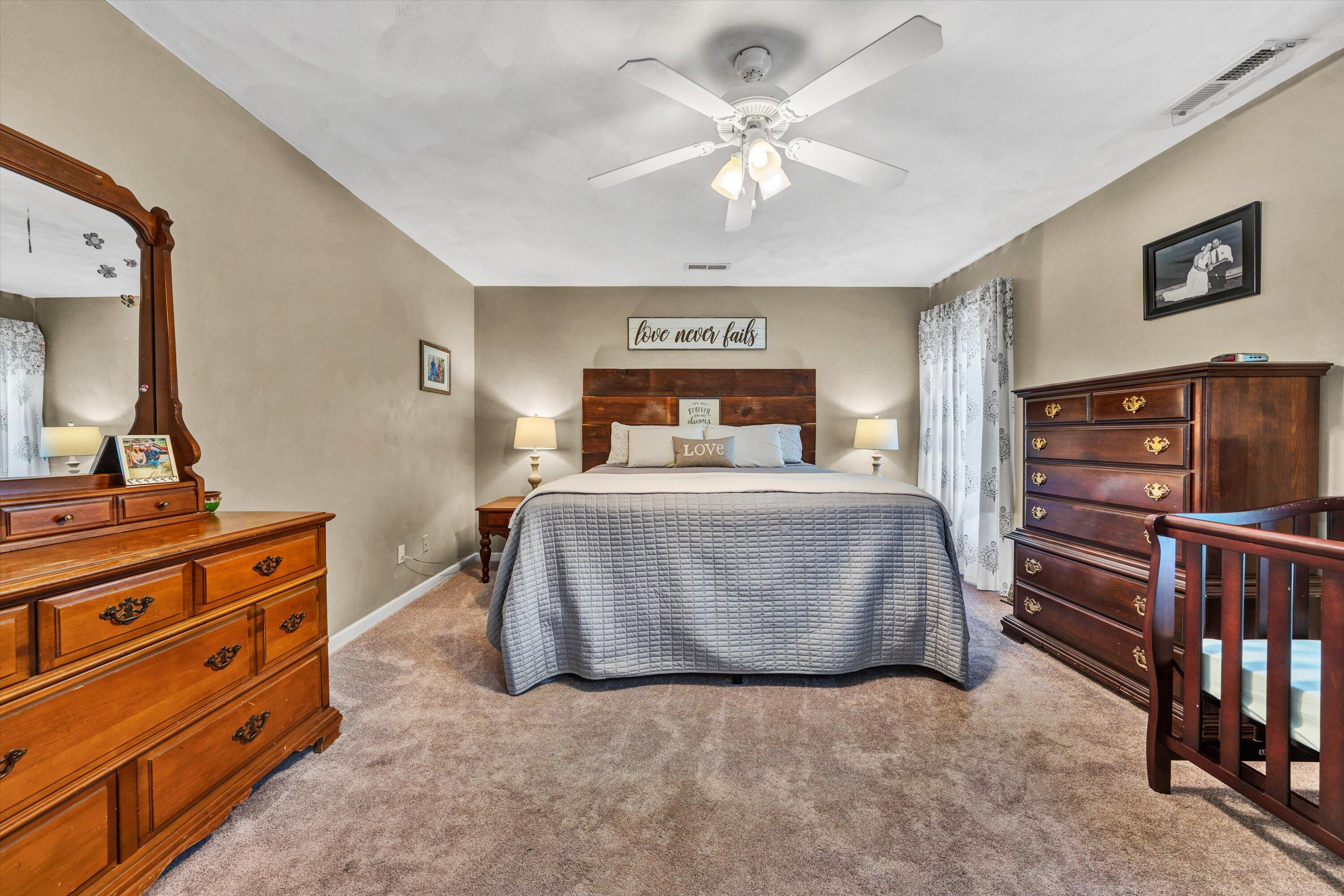 140 Charlie Road Hardy, VA 24101 - Photo 20 of 33 a living room with furniture and a flat screen tv