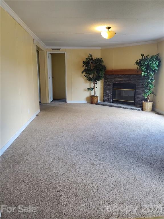 1282 Macedonia-Angelus Road Jefferson, SC 29718 - Photo 16 of 26 a view of empty room with a fireplace