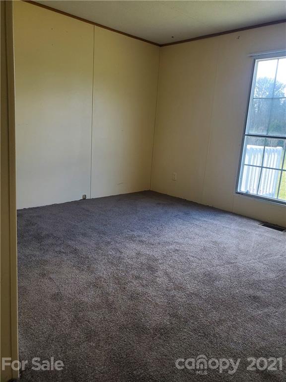 1282 Macedonia-Angelus Road Jefferson, SC 29718 - Photo 20 of 26 an empty room with a window